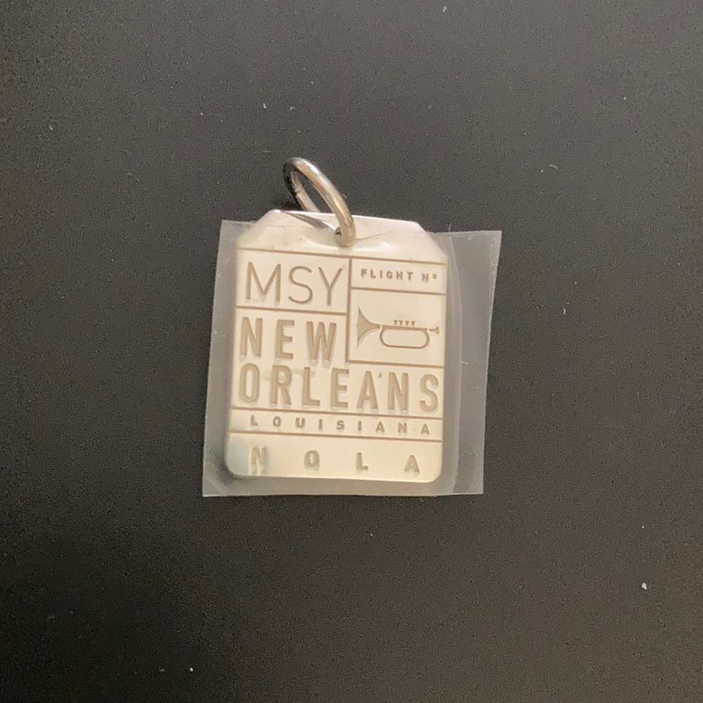 Tiny airport luggage tag sterling